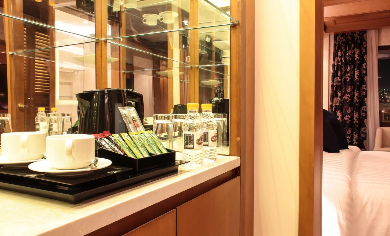 Thousand Nights Hotel Amman Exterior photo A Nespresso machine in a hotel room