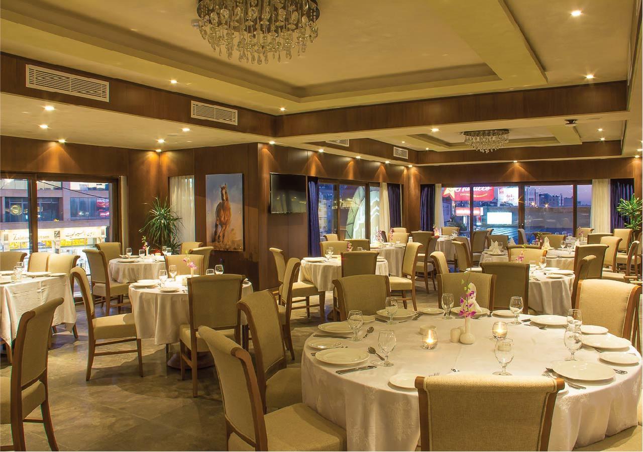 Thousand Nights Hotel Amman Exterior photo Restaurant interior