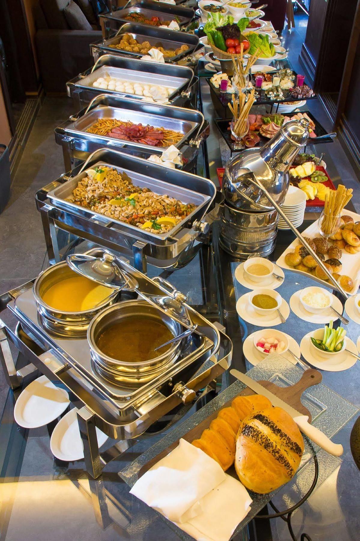 Thousand Nights Hotel Amman Exterior photo A chafing dish